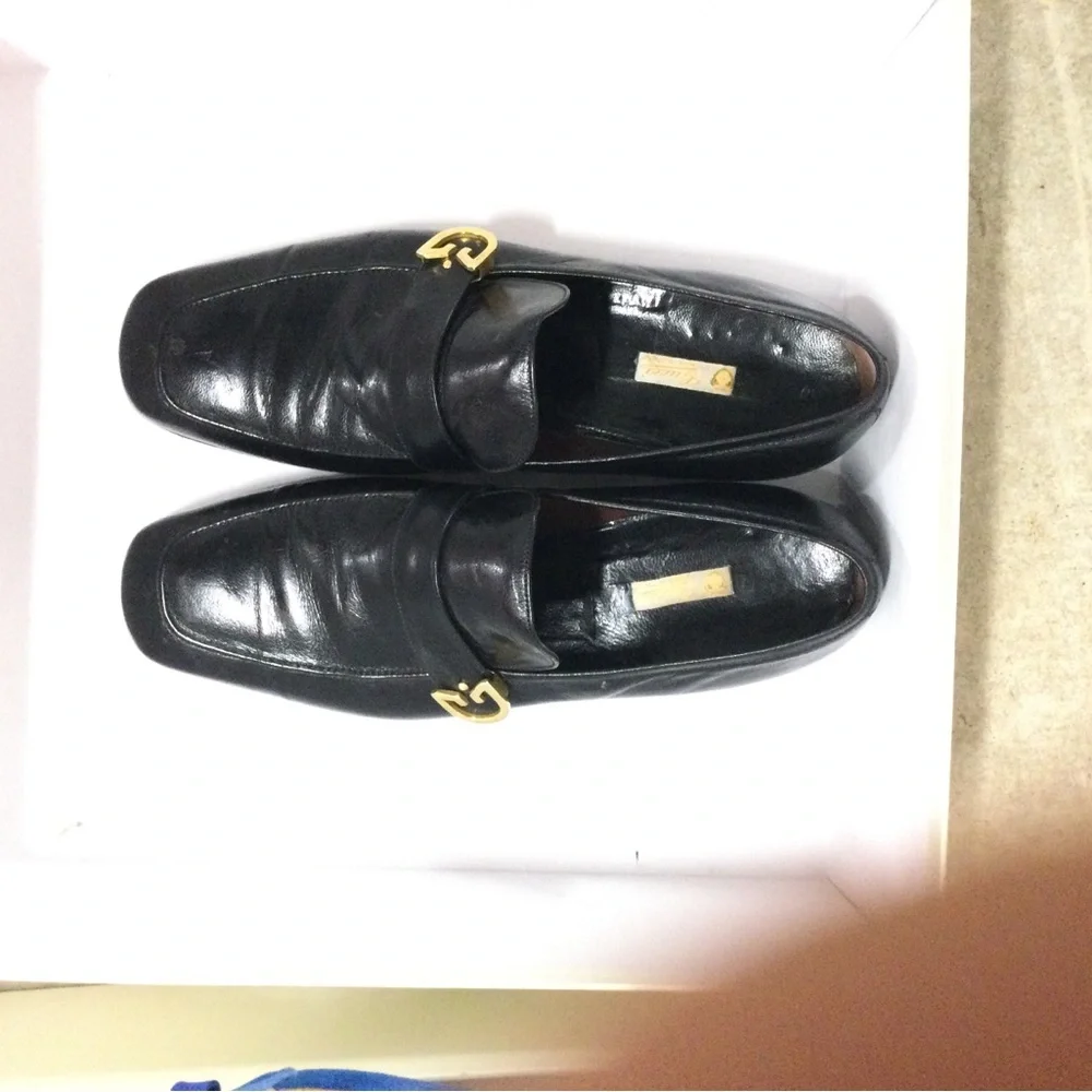 Classic Black Leather Slip-On Loafers with Gold Hardware